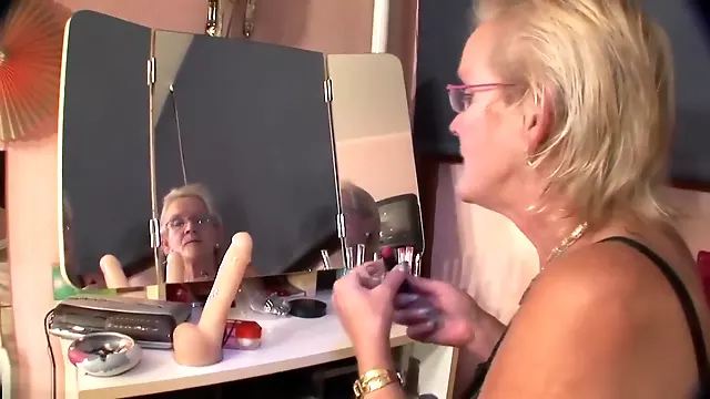 Old, blonde, Dutch, grandma masturbates and fingers her old cooch.